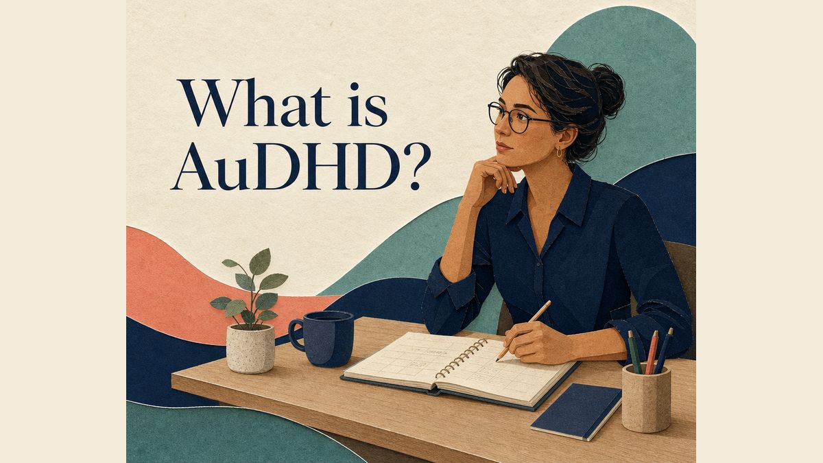 Original ivory paper-collage illustration titled What is AuDHD?, showing a thoughtful adult at a desk with an open planner, surrounded by navy, teal and coral curved layers suggesting structure and flexibility.
